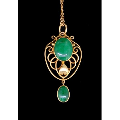 JADE AND PRECIOUS YELLOW METAL PENDANT AND CHAIN, set with a...