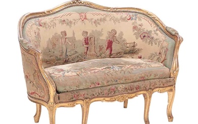 LOUIS XV STYLE CARVED AND GILT WOOD SETTEE C 1900.