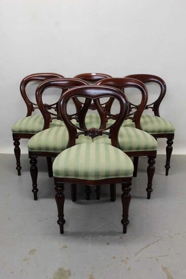 Long set of twelve Victorian style mahogany balloon back dining chairs