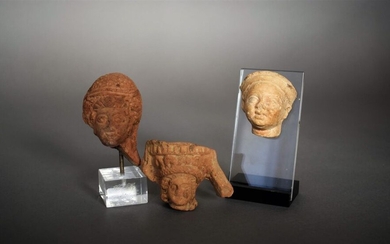 Lot comprising three pieces: - a child's head...