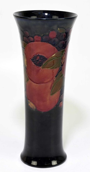 MOORCROFT; a 'Pomegranate' pattern vase, decorated in shades of red,...