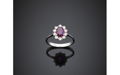 Oval ct. 0.90 circa ruby and diamond white gold cluster ring, g 3.14 size 16/56.Read more
