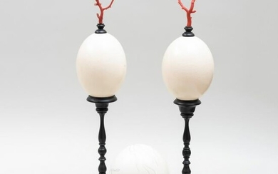 Pair of Ostrich Eggs on Ebonized Mounts and Another