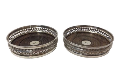 Pair of contemporary silver pierced coasters