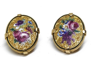 Pair of gold enamelled ear BUTTONS with floral decoration. Gross weight 5,3 g