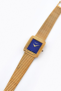 Patek Philippe. A Yellow Gold Rectangular Bracelet Watch with Lapis Lazuli Dial
