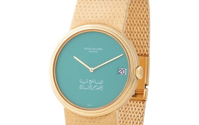 Patek Philippe. Very Fine and Special Calatrava Automatic Wristwatch in Yellow Gold, Reference 3601/101, With Pale Green Dial Made for Colonel Muammar Gaddafi