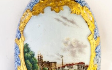 RARE RUSSIAN RELIEF PORCELAIN EASTER EGG SHOWING A VIEW OF ST. PETERSBURG AND FLOWERS