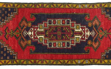 Rectangular Persian red and blue ground rug having an allove...