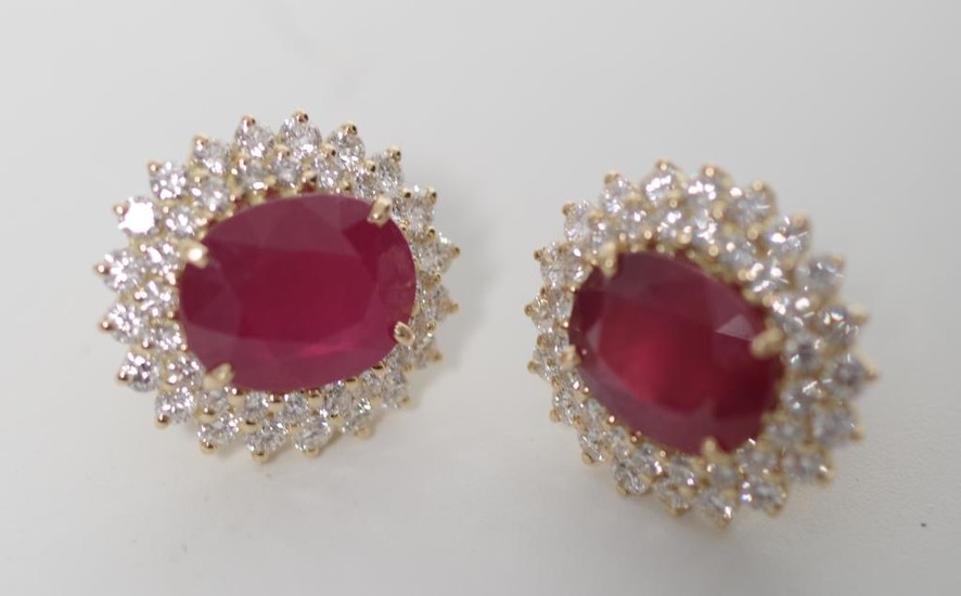 Ruby, diamond and 18ct yellow gold earrings in a cluster stu...