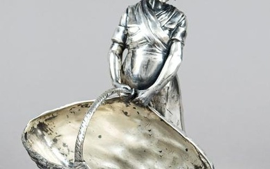 Standing young woman in traditional costume with large basket, German, c. 1900, Kayser pewter