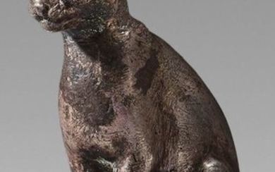 Statuette of Bastet cat sitting with her tail...