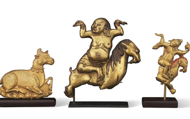 THREE GILT-BRONZE PLAQUES WITH MYTHOLOGICAL BEASTS TIBET, 17TH CENTURY