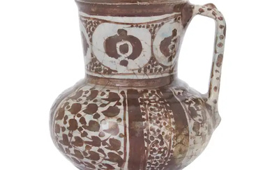 To Be Sold With No Reserve A Kashan lustre pottery Jug, Persia,...