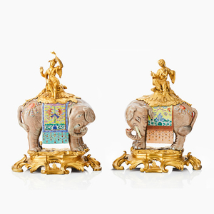 Two Chinese porcelain elephants with Ormolu mounts