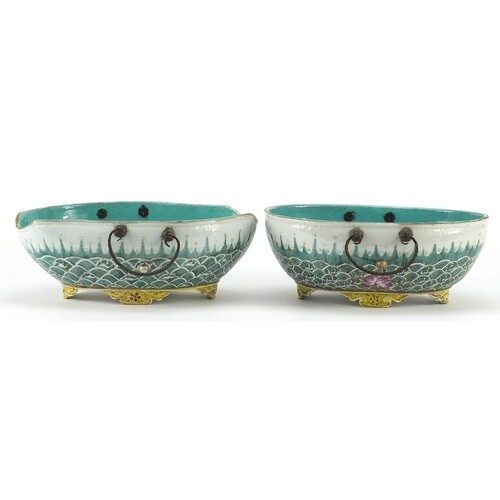 Two Chinese porcelain four footed bowls with metal handles, ...