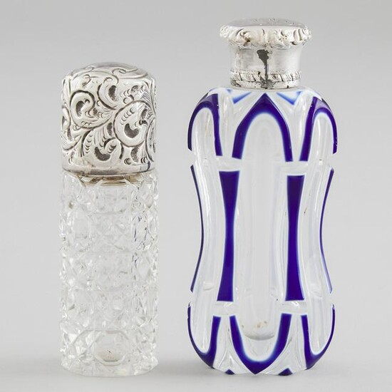 Two English Silver Mounted Glass Perfume Bottles, one