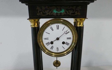 Wooden collonade shaped open backed mantle clock, the back marked...