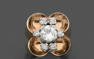 CIRCA 1935 DIAMOND RING A diamond, platinum and gold ring....