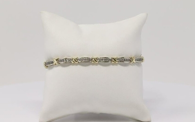 14Kt Ladies Yellow & White Gold Diamond Bracelet.