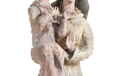 An early 20th century painted and carved wood figure group depicting Madonna and the child. H. 164 cm.