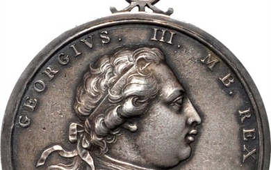 1773 Carib War medal. Cast silver, 55.2 mm, 68.8 mm including integral loop. Betts-529. MY-72, BBM-19. About Uncirculated.
