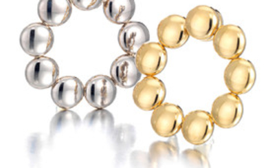 A pair of 18k bi-color gold reversible "Honeymoon" ear clips,, Cartier