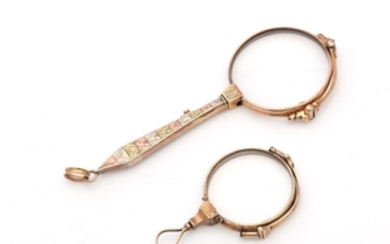 A 19th century unmarked vari-coloured gold folding lorgnette...