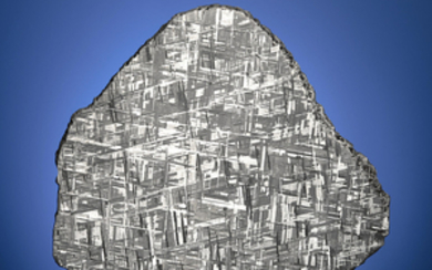 A MUONIONALUSTA METEORITE SLICE — SHIMMERING CRYSTALLINE STRUCTURE, Iron, fine octahedrite, IVA Kiruna, Sweden (67°48’ N, 23°6’ E)
