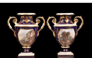 A pair of Derby (Rbt. Bloor) blue-ground and gilt two-handled urns painted with titled landscape views