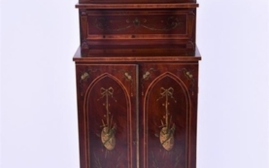 An Edwardian side cabinet of small proportions in the Sheraton revival style mahogany veneered, with twin panelled doors...