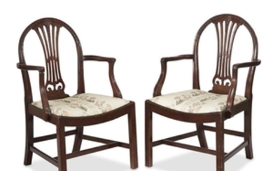 A pair of George III mahogany armchairs with floral...