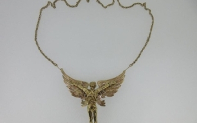 A gold pendant necklace with fully modelled figure of