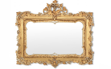 A giltwood and composition mirror