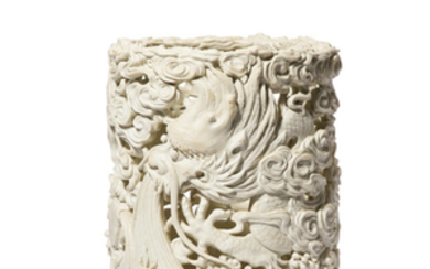 A CARVED BISCUIT PORCELAIN ‘DRAGON’ BRUSHPOT, REPUBLIC PERIOD (1912-1949)