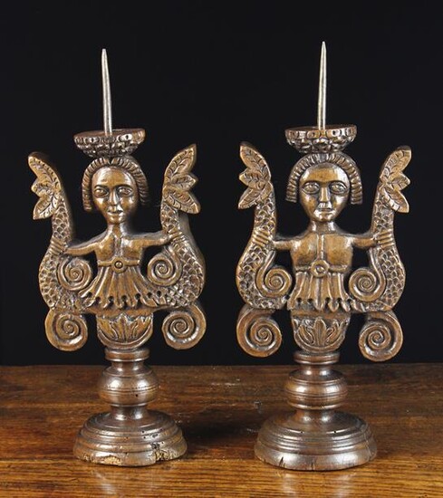 A Pair of Unusual 17th Century Carved Walnut Prick