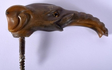A 19TH CENTURY MIDDLE EASTERN CARVED RHINOCEROS HORN