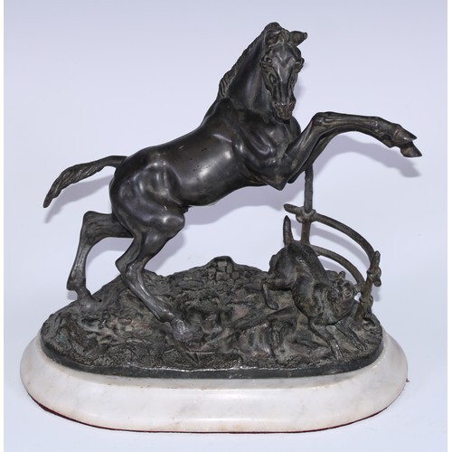 A 19th century animalier group, cast as a horse rearing, sta...