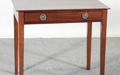 A 19th century mahogany side table, containing a single drawer...