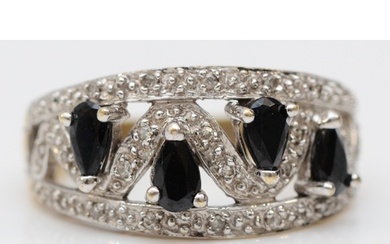 A 9ct gold black gemstone and diamond dress ring N, 4.2gm