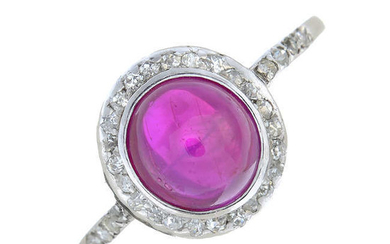 A Burmese ruby cabochon and old-cut diamond cluster ring.