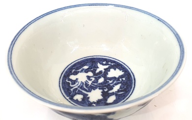 A CHINESE BLUE AND WHITE BOWL; Lotus flower design