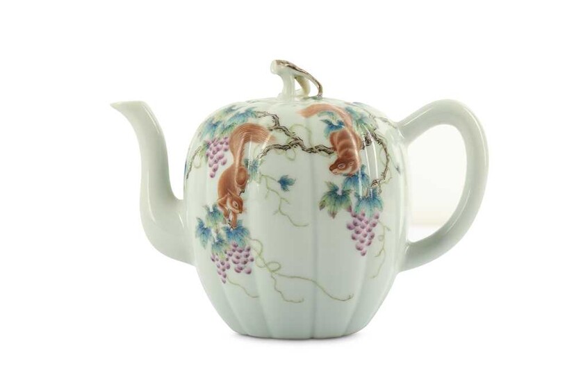 A CHINESE FAMILLE ROSE 'SQUIRRELS AND VINES' TEAPOT AND COVER.