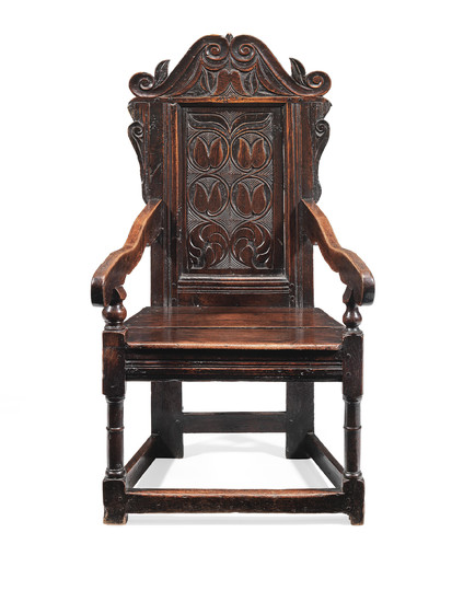 A Charles II joined oak panel-back open armchair Yorkshire, circa 1670
