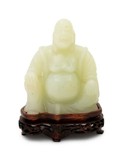 A Chinese Serpentine Figure of a Laughing Buddha