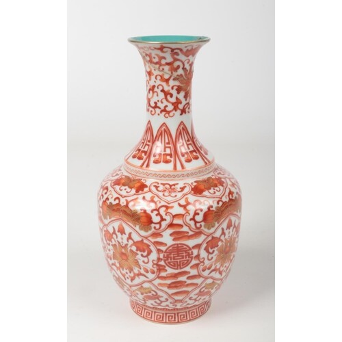 A Chinese baluster shaped vase decorated in iron red enamel,...