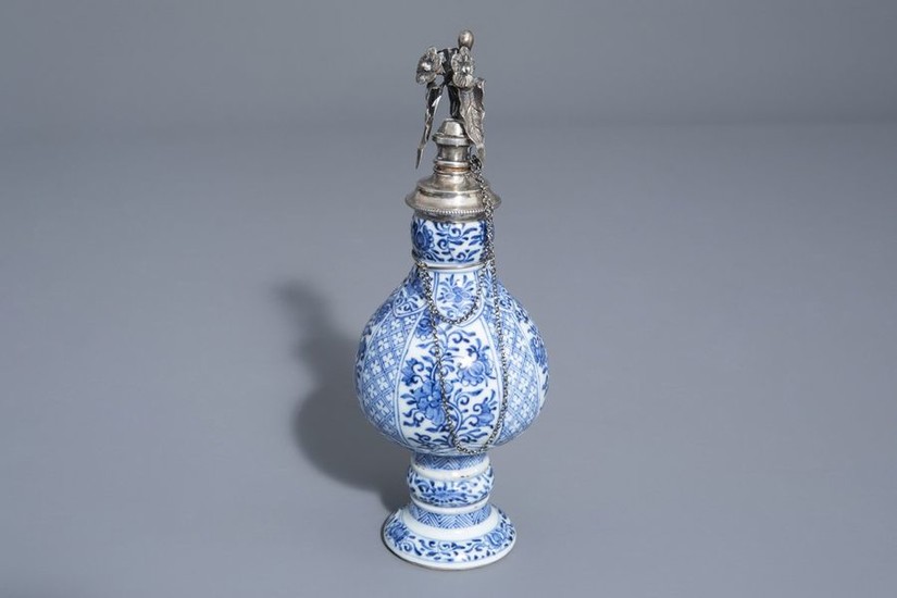 A Chinese blue and white silver mounted vase...