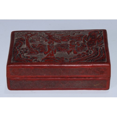 A Chinese cinnabar lacquer rectangular box and cover, carved...