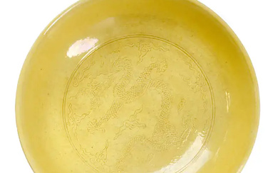 A Chinese yellow glazed 'dragon' dish Qing dynasty, Daoguang mark and period...