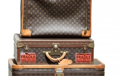 A Collection of Four Louis Vuitton Suitcases